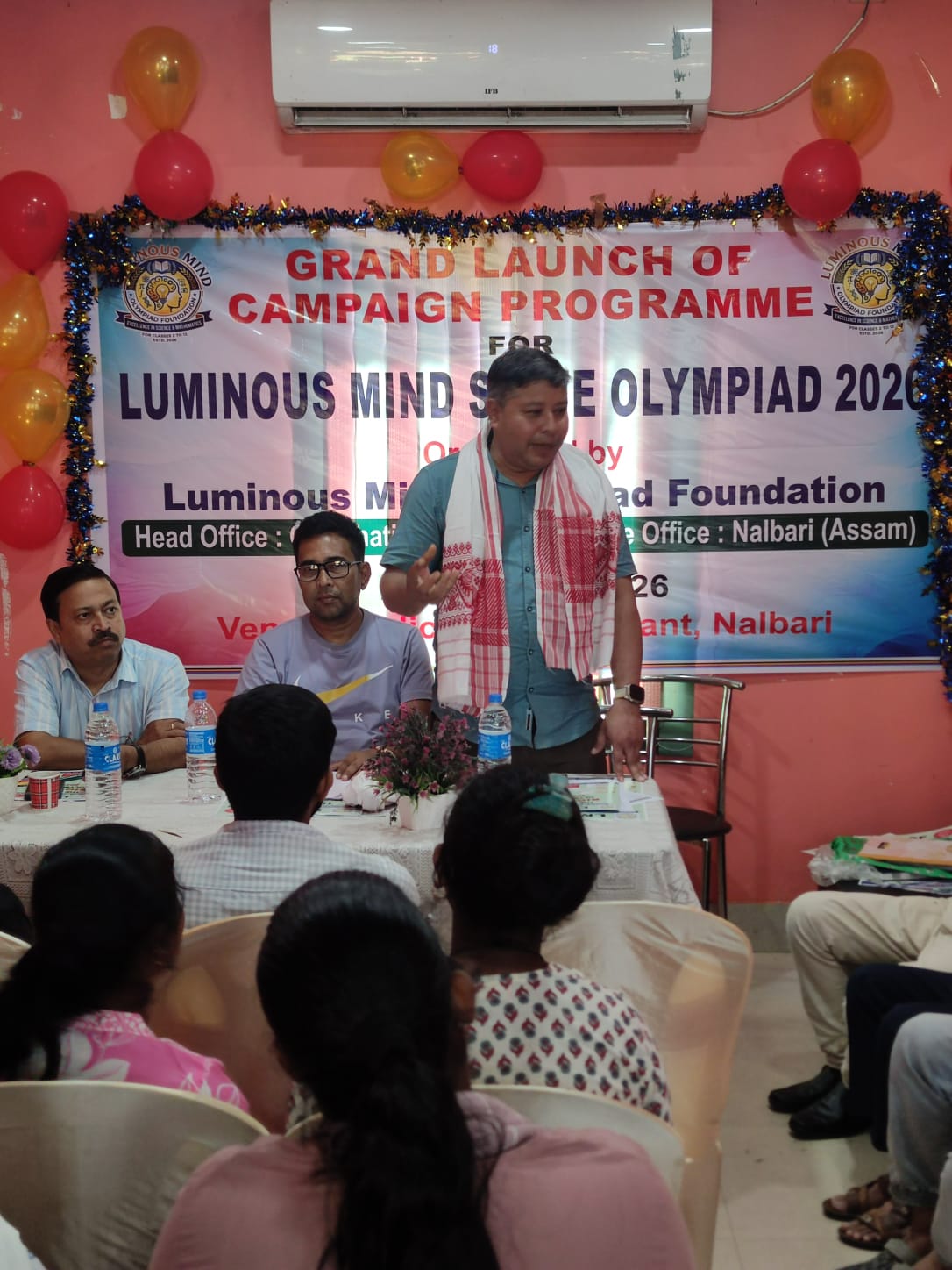 Close view of the director addressing the launch event